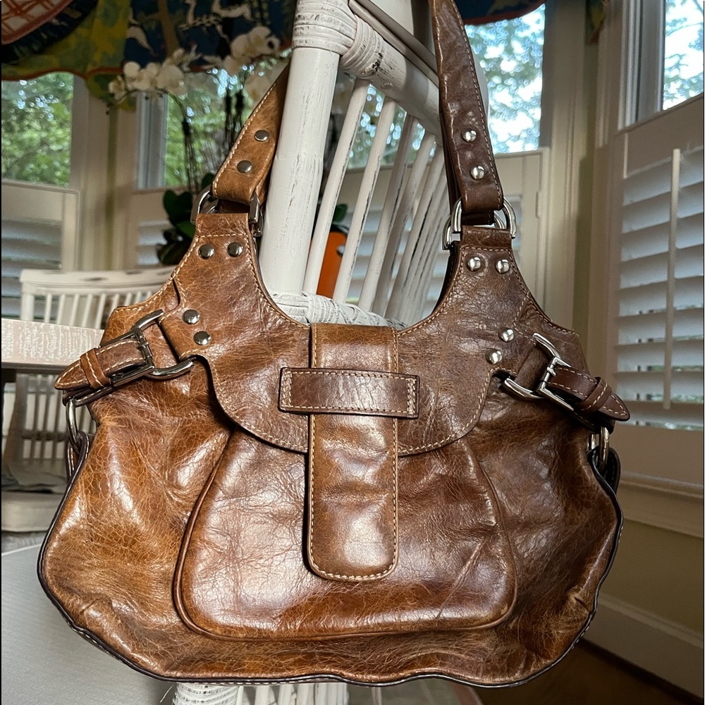 Distressed leather handbag